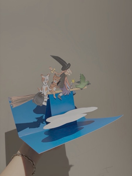 pop-up cards — a cut paper witch, cat and crow on a blue folded card